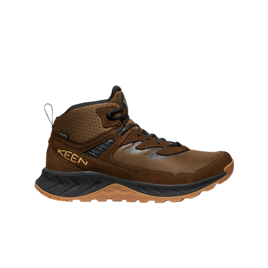 Brown hiking boot with black accents on a white background