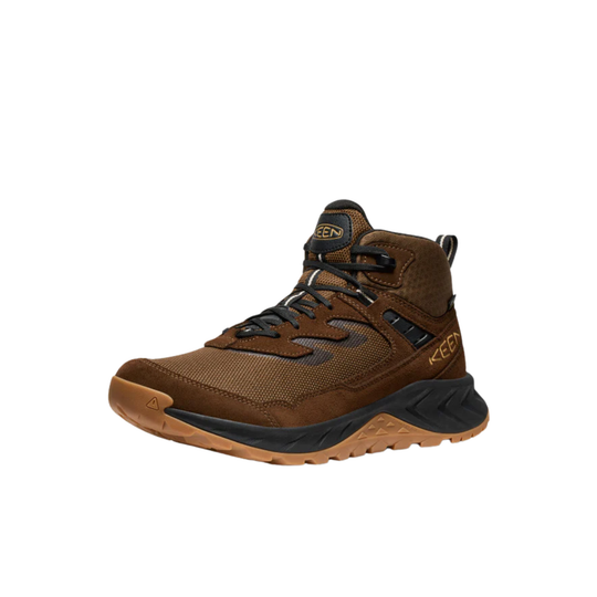 Brown hiking boot with black accents on a white background