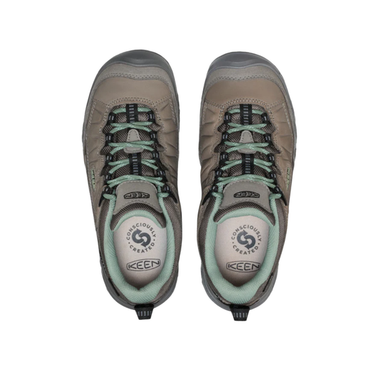 Pair of gray and mint green hiking shoes on a white background, seen from above
