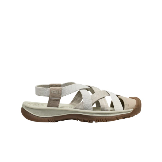 Beige sandal with brown sole on a white background
