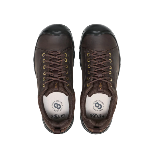 Pair of brown KEEN shoes on a white background