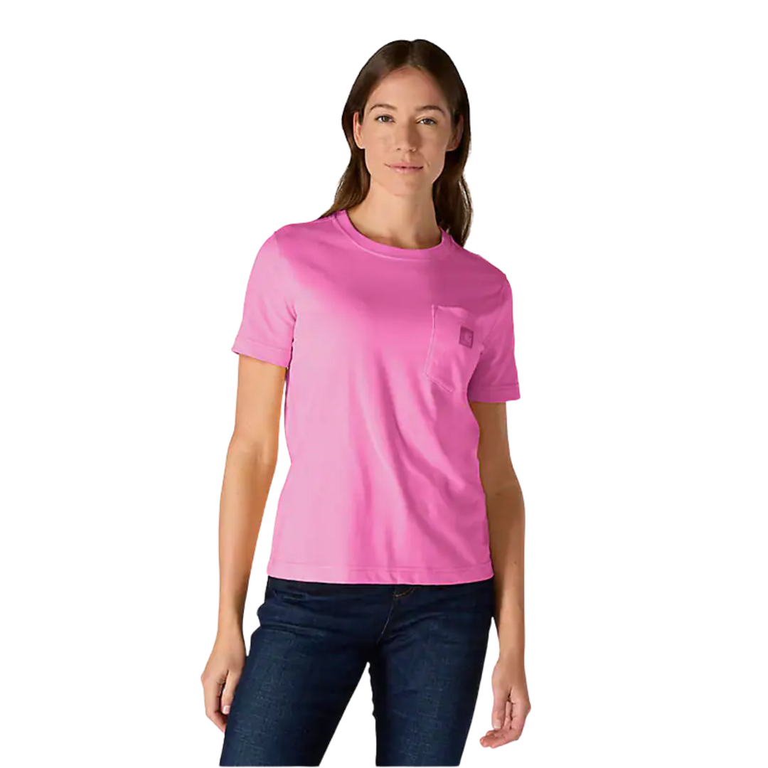 Woman wearing a pink t-shirt and blue jeans on a white background