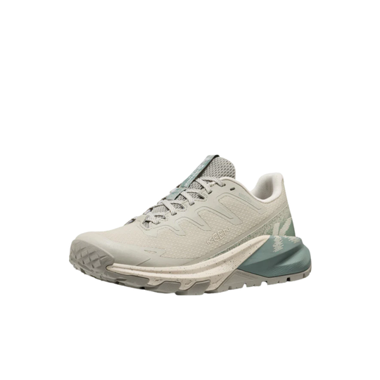 Light gray athletic shoe with a white sole on a white background