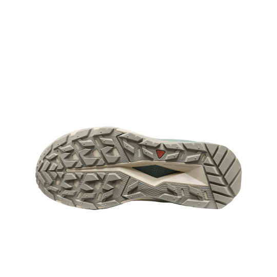 Close-up of a hiking shoe sole with tread pattern on a white background