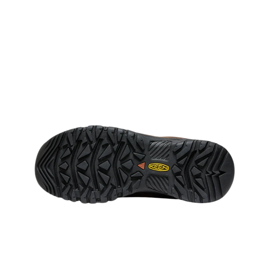 Black hiking shoe outsole with a yellow KEEN logo on a white background