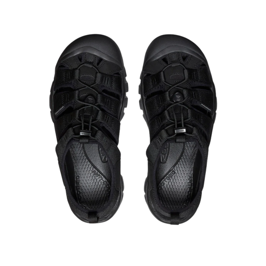 Pair of black sandals on a white background