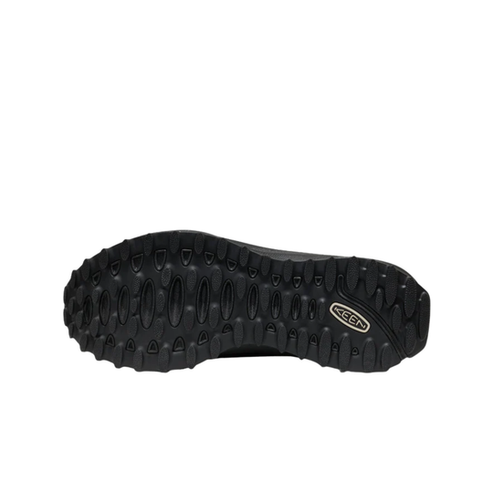 Black shoe sole with brand logo on a white background
