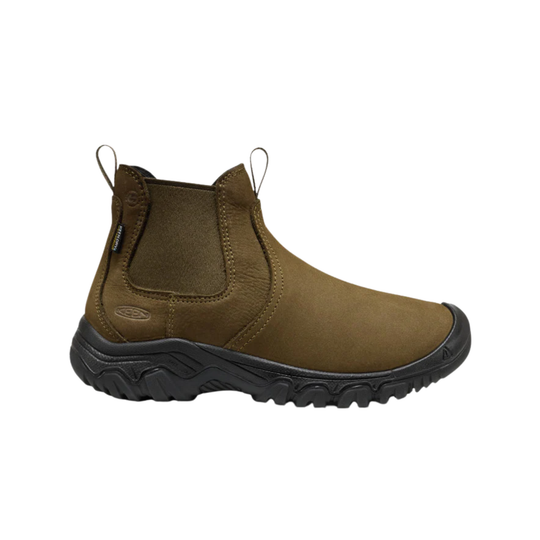 Brown boot with black sole on a white background