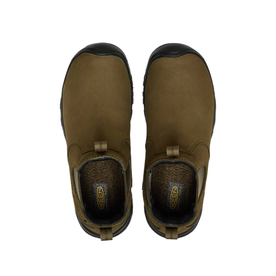 Pair of brown slip-on boots with black soles on a white background