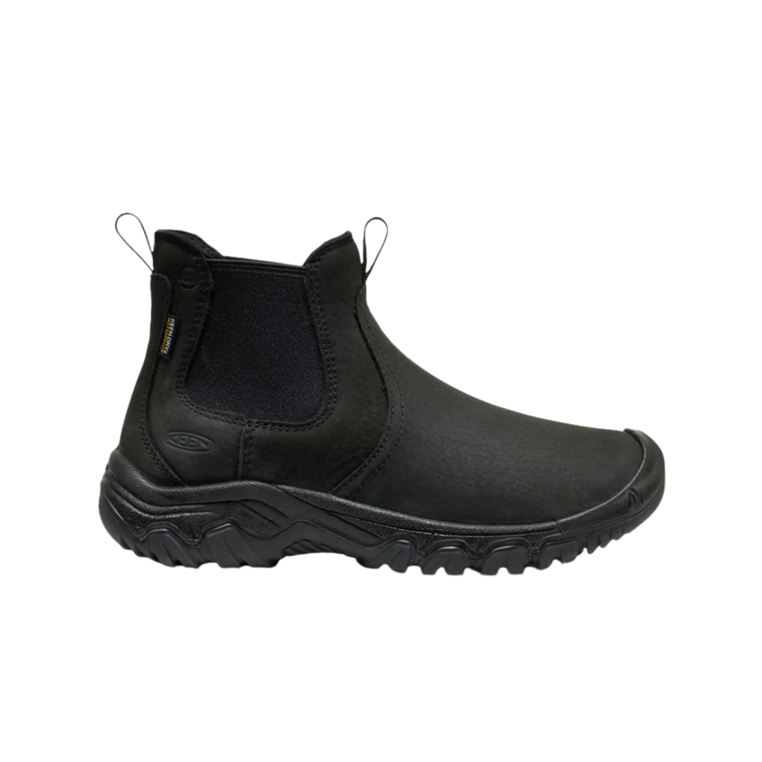 Black Chelsea boot on a white background
