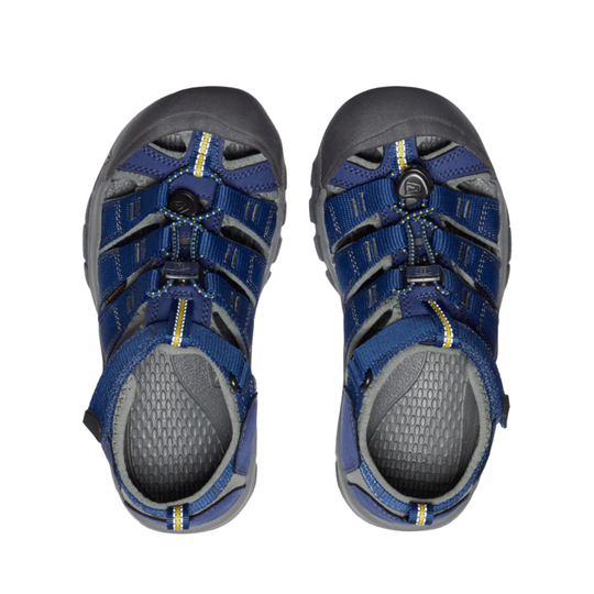 Pair of blue and gray sandals on a white background