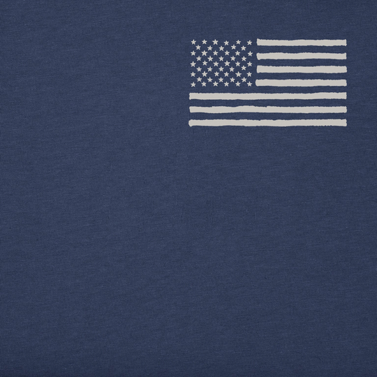Navy blue t-shirt with a white American flag graphic on a plain background