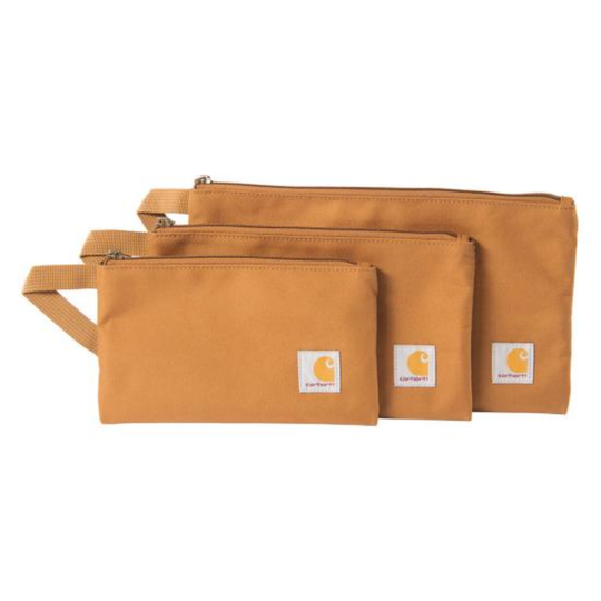 three different sized Carhartt bags brown
