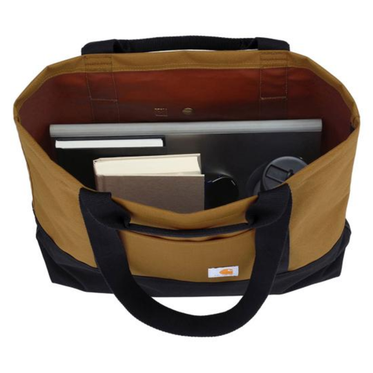 Brown bag with black handles containing books and a laptop on a white background