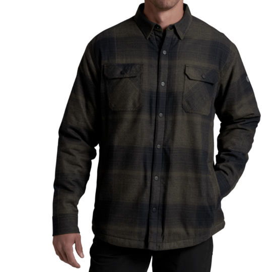 Dark plaid shirt worn by a person on a white background