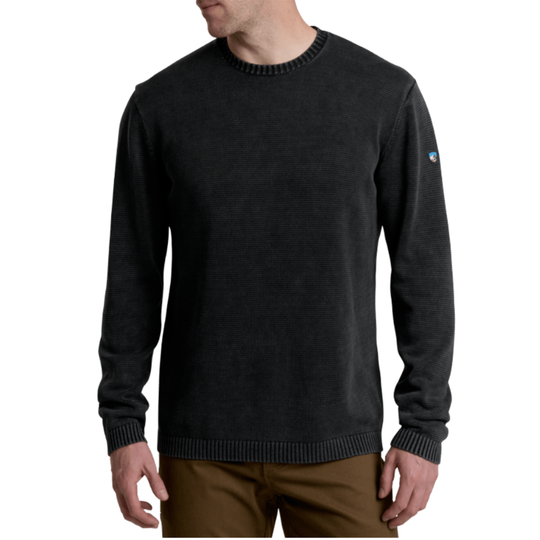 Black sweater worn by a person on a white background