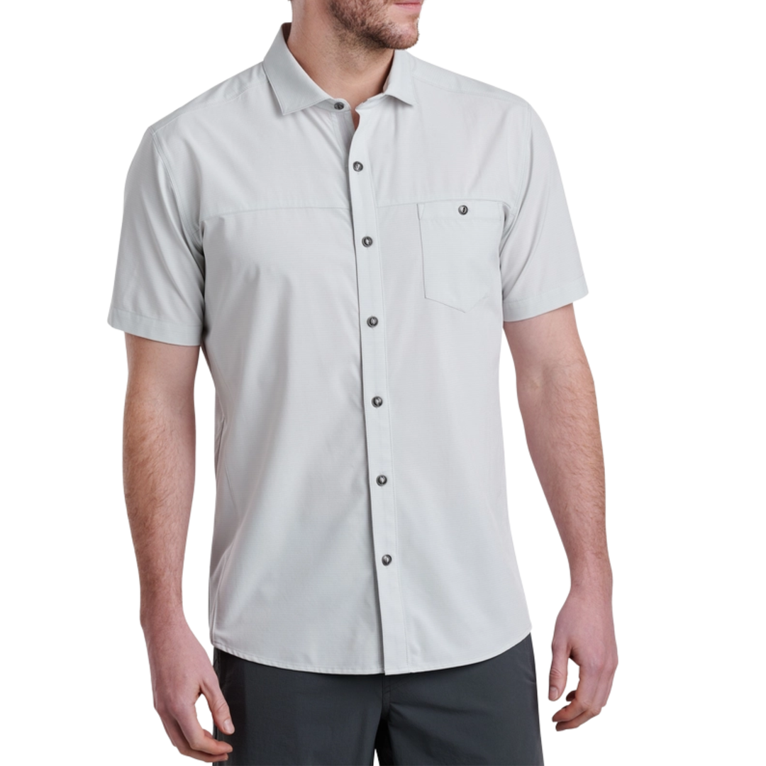 Light gray short-sleeve shirt worn by a person on a white background