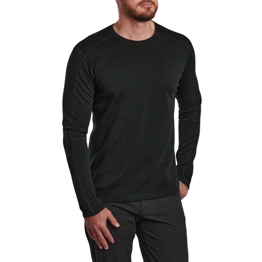 Person wearing a black long-sleeve shirt on a white background