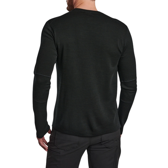 Black long-sleeve shirt worn by a person on a white background