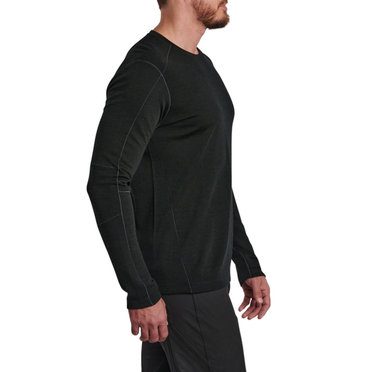 Person wearing a black long-sleeve shirt on a white background