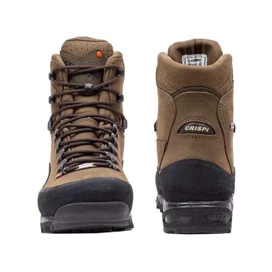 Brown hiking boots with black soles on a white background, featuring the Crispi brand.