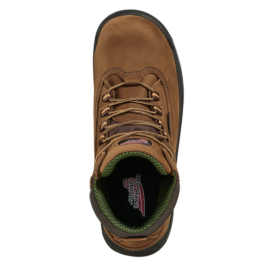 Brown leather boot with green lining on a white background