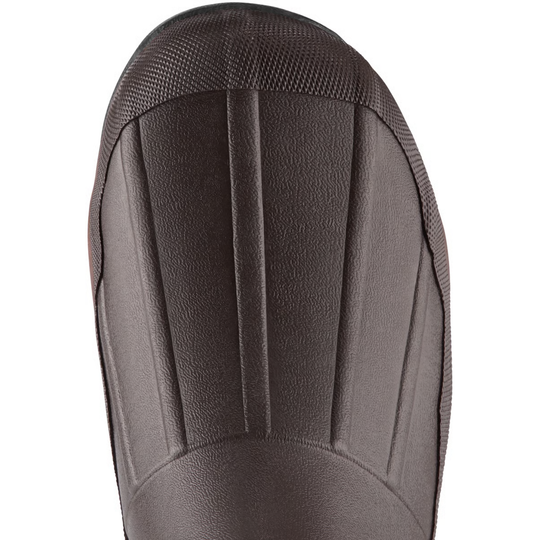 Close-up of a brown leather shoe sole on a white background