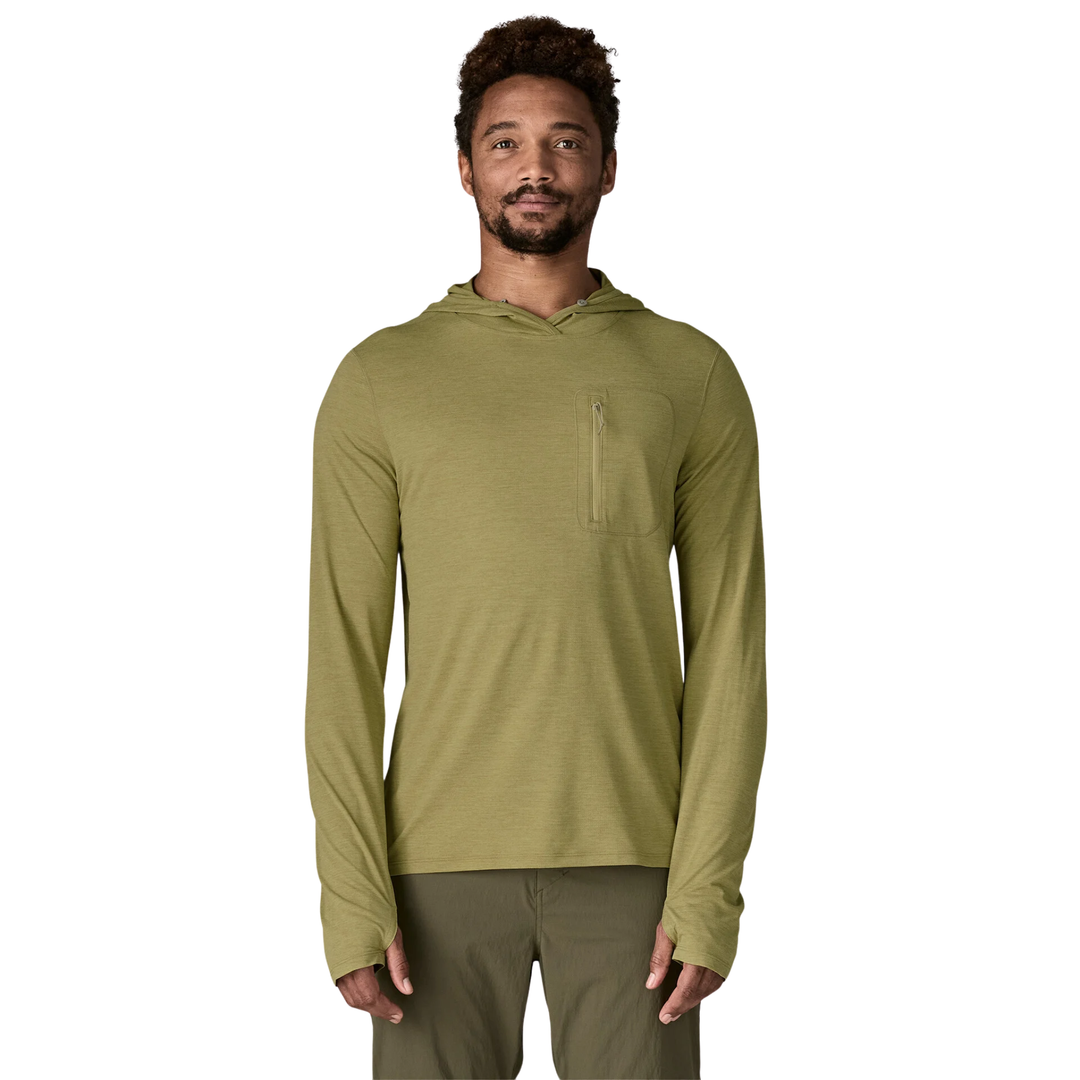 Man wearing a green hoodie on a white background