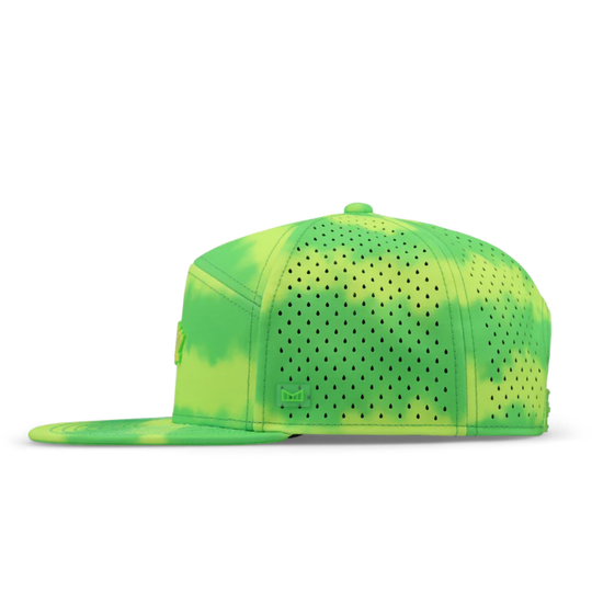 Green and yellow cap with perforated design on a white background