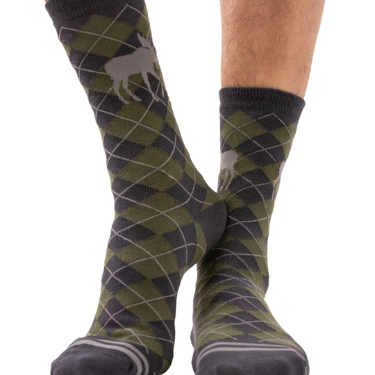 Green and gray argyle patterned socks with a moose design on a white background