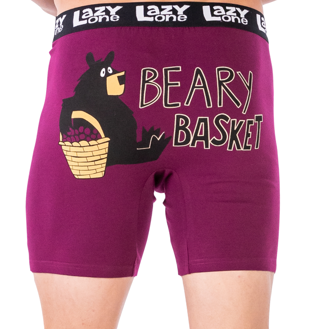 Purple shorts with bear graphic and 'Beary Basket' text, brand 'Lazy One' visible.