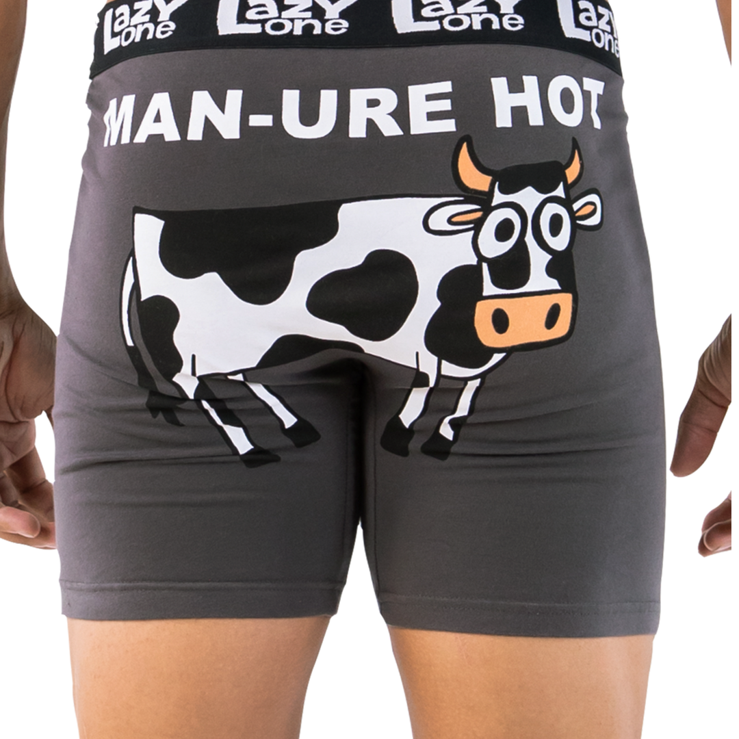 Gray boxer briefs with a cow design and text on a white background