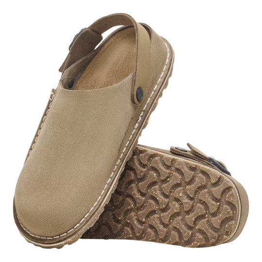 Pair of tan clogs with a textured sole on a white background