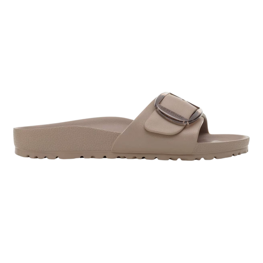 Beige sandal with a strap on a white background