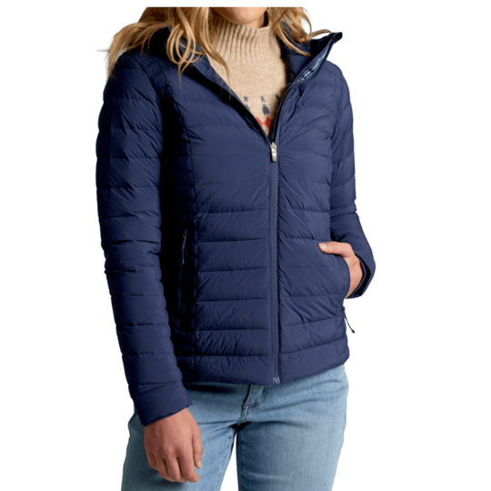 Navy blue puffer jacket worn by a person on a white background