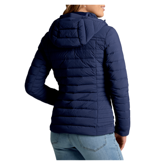 Navy blue puffer jacket worn by a person on a white background