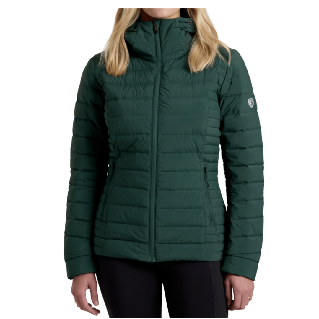 Green puffer jacket worn by a person on a white background