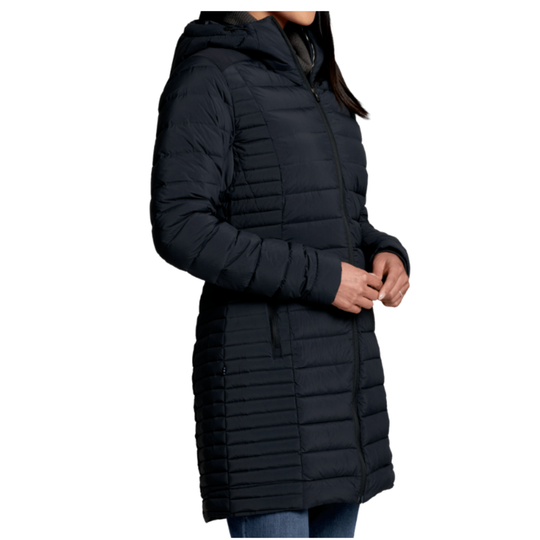 Black puffer coat worn by a person on a white background