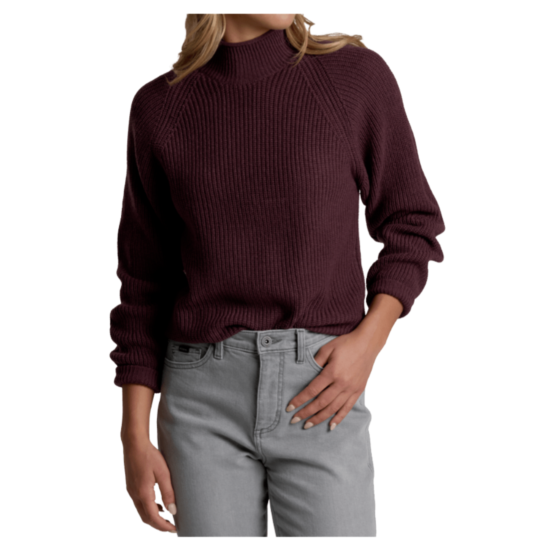 Person wearing a maroon sweater and gray jeans on a white background