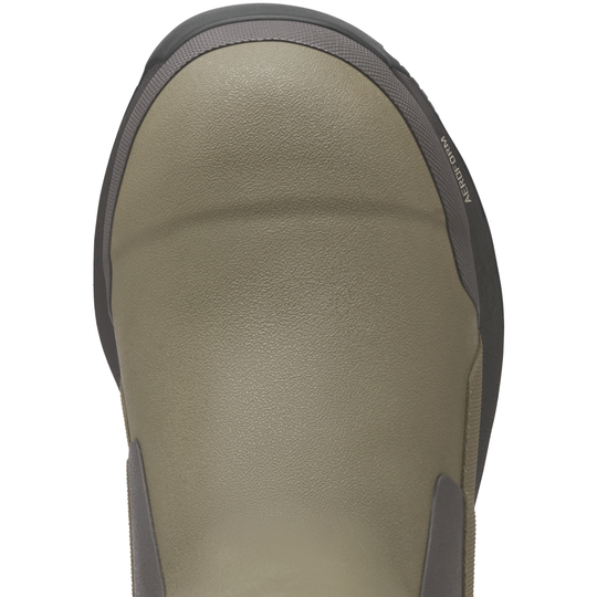 Close-up of a green shoe with gray accents on a white background