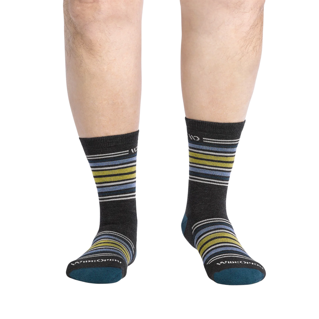 Striped socks worn on a white background