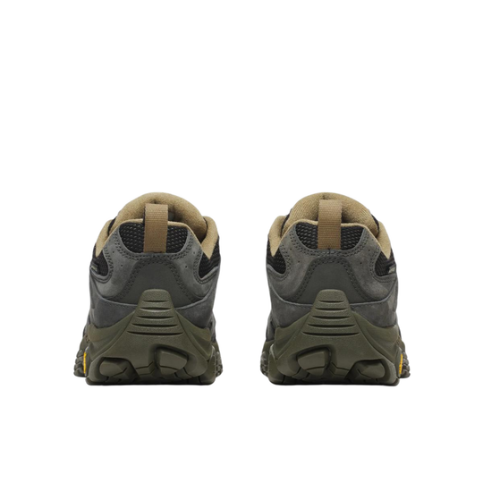 Pair of green hiking boots with brown accents on a white background