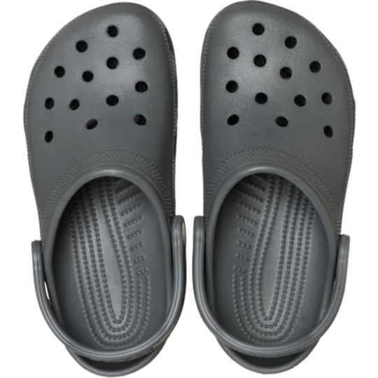 Pair of gray clogs on a white background