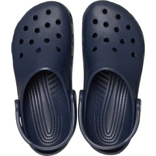 Pair of navy blue clogs on a white background