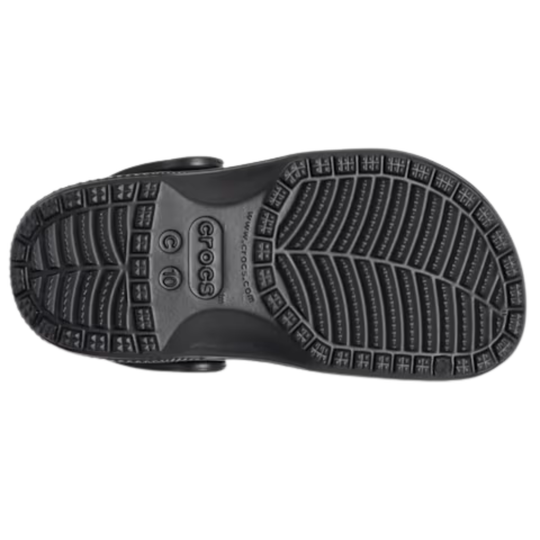 Black Crocs sandal sole on a white background