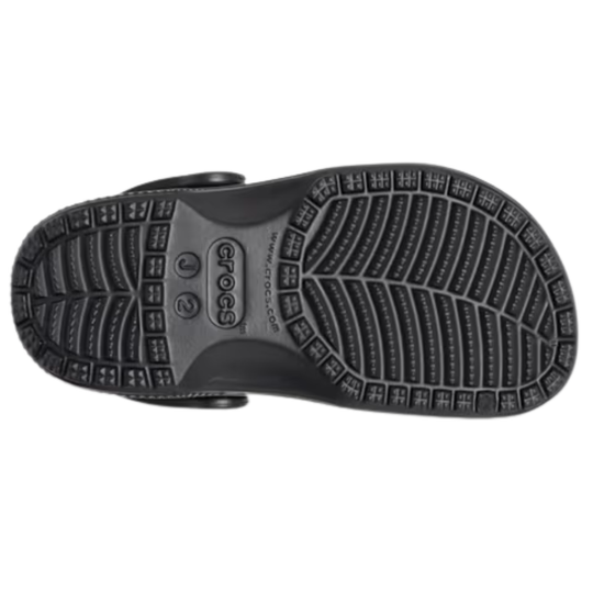 Black Crocs sandal sole on a white background