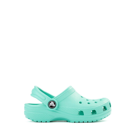 Mint green clog shoe on a white background
