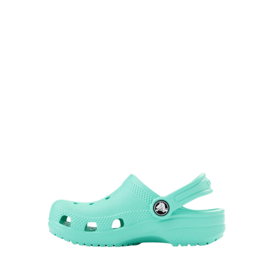 Turquoise clog shoe on a white background