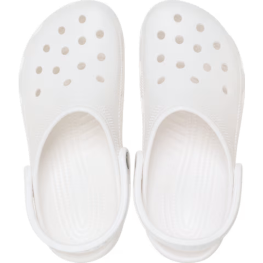 Pair of white clogs with open design on a white background