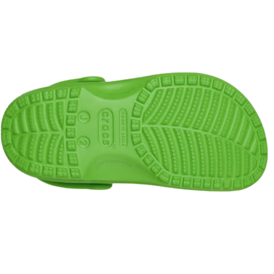 Green sandal sole with textured pattern on a white background